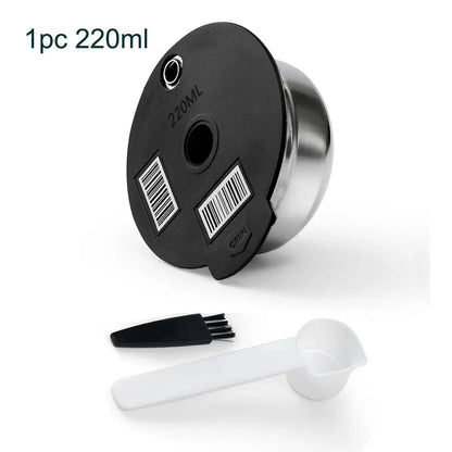 Black and silver container with a white scoop and brush on a white background